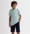 KIDS ONLY Mild Inexperienced Brief Sleeve Polo Blouse New Glance