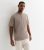 Males’s Mild Brown Piqué Cotton Outsized Polo Blouse New Glance